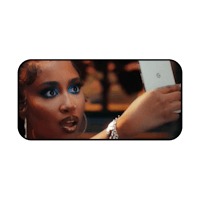 a woman is taking a picture of herself with a cell phone